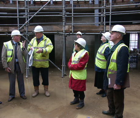 a public panel supervise the construction of a facility